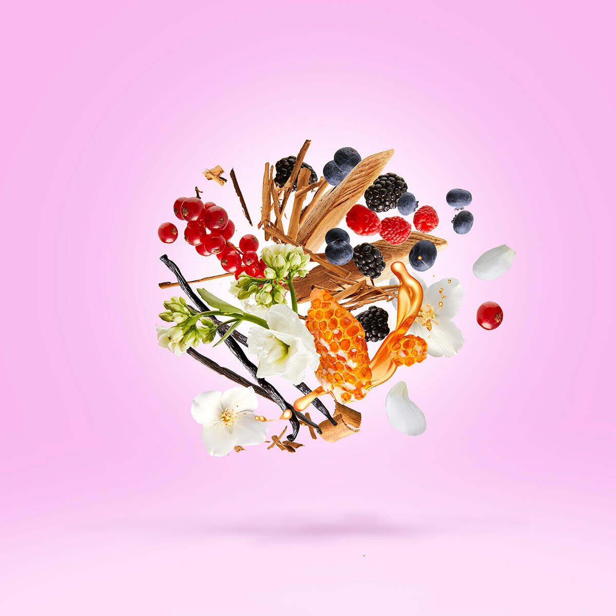 a close up of a flower arrangement in a vase