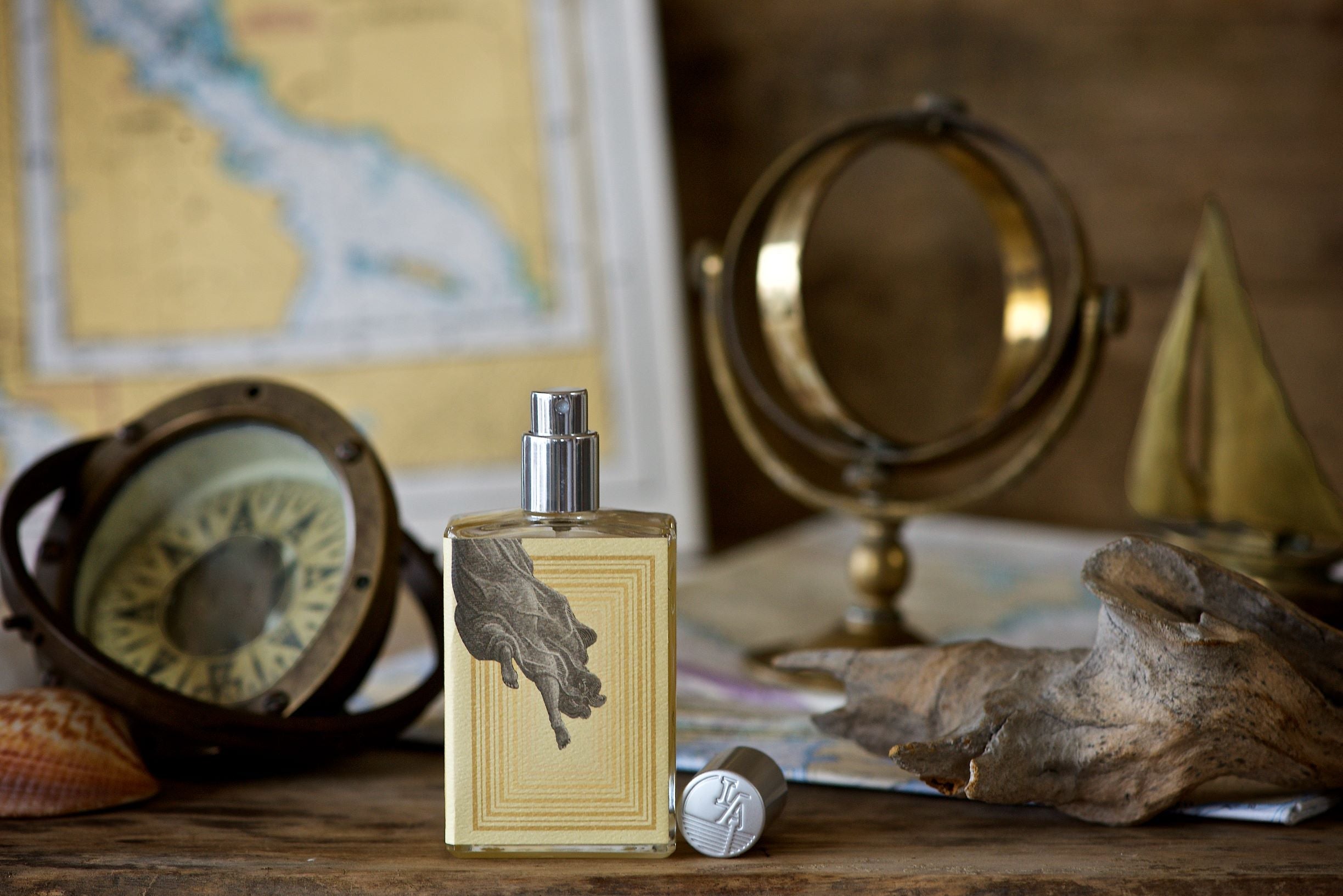 a table with a clock and other items on it